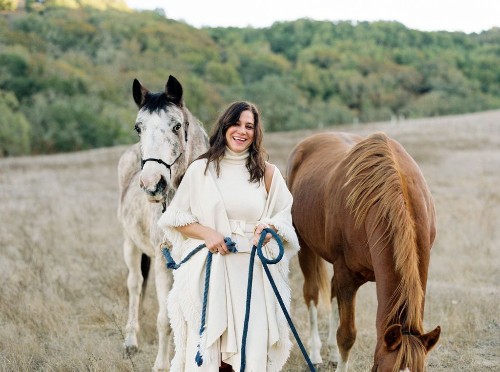 Elizabeth Goodwin Welborn founder of Stick and Ball with polo ponies welcoming 2021