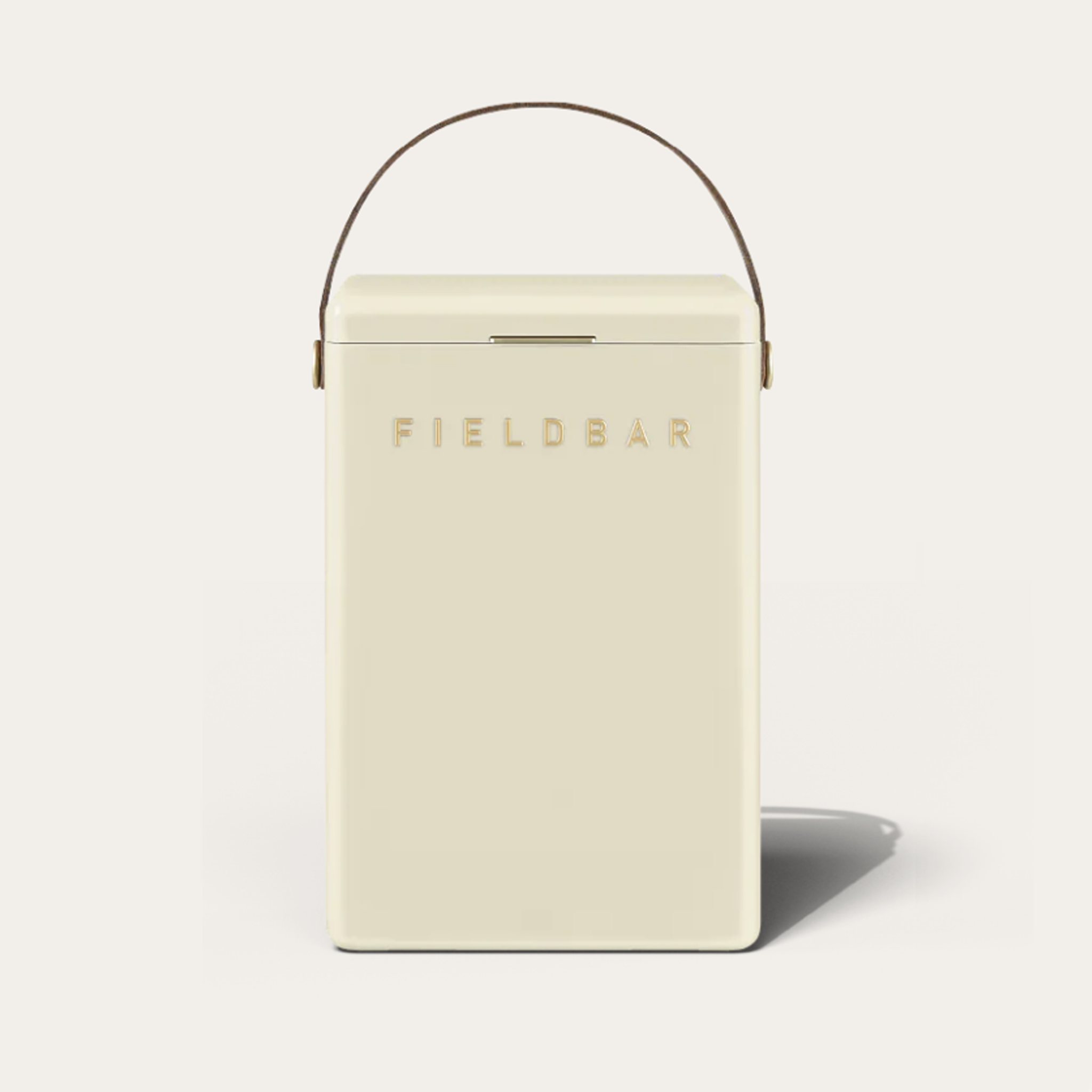 Cream-colored container with 'FIELDBAR' branding on a light gray background