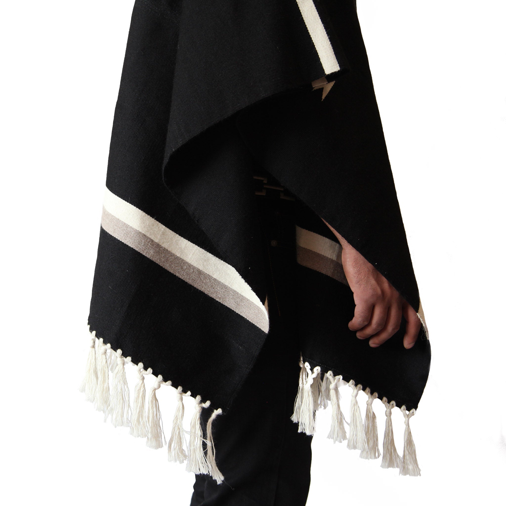 Pattern and tassel details of Handwoven Unisex Starburst Alpaca Poncho - Stick & Ball