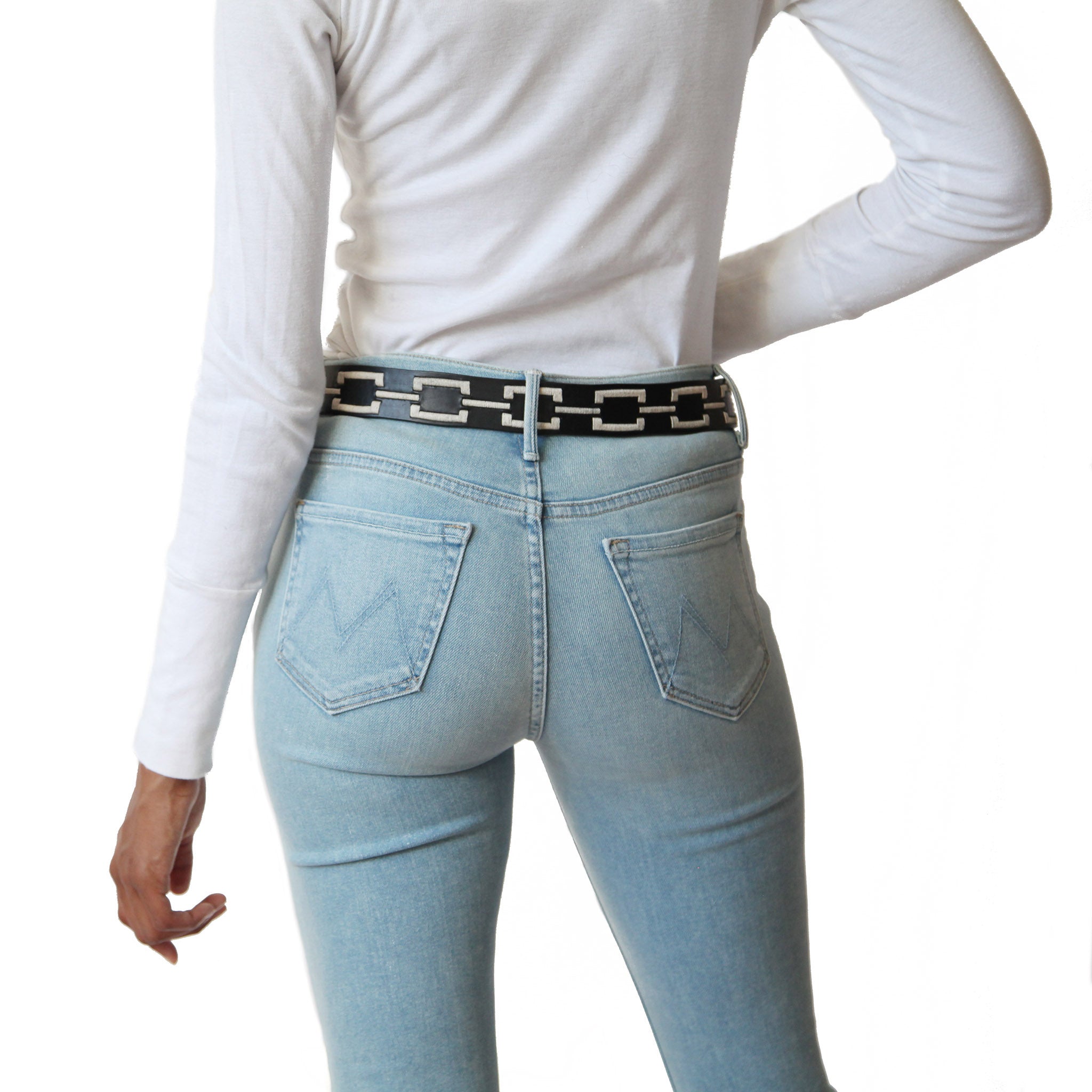 woman-wearing-stick-and-ball-accessory-correntino-polo-leather-belt-in-black-with-ivory-stitch