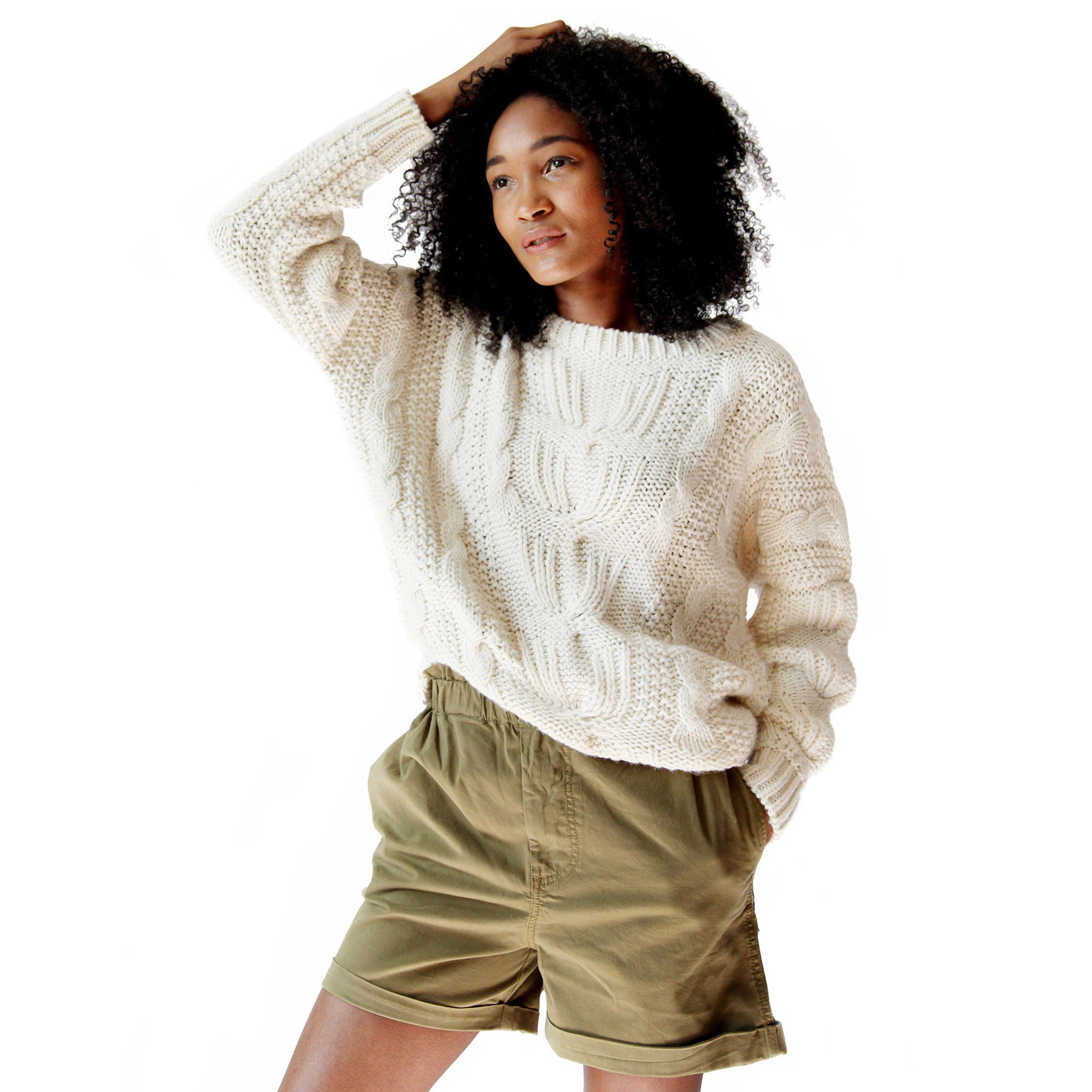 Woman-wearing-stick-and-ball-alpaca-knitwear-sarah-cable-cream