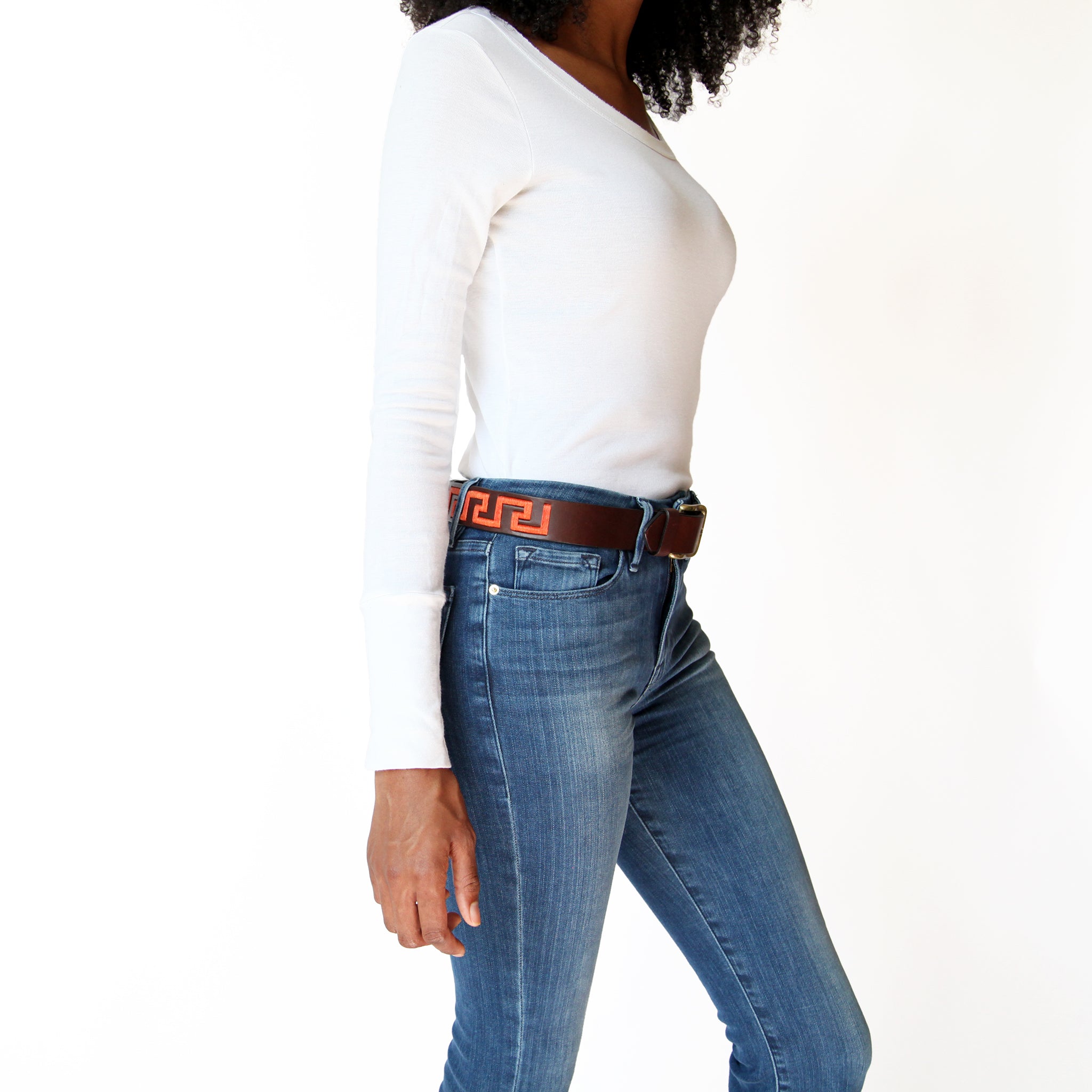 woman-wearing-stick-and-ball-accessories-leather-belt-inca-polo-belt-dark-brown-with-coral-stitch
