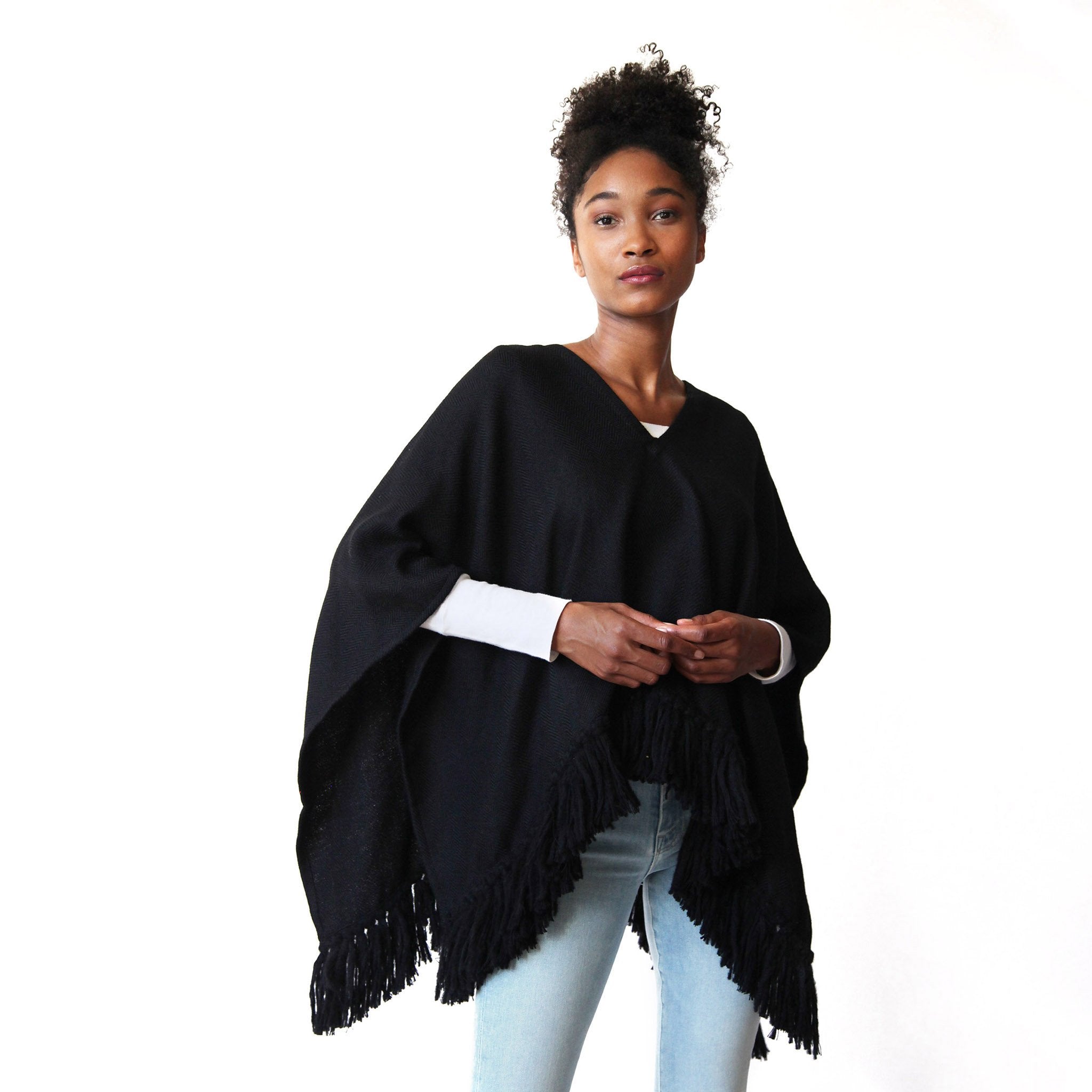 woman-wearing-stick-and-ball-apparel-womens-alpaca-poncho-cropped-fringe-black