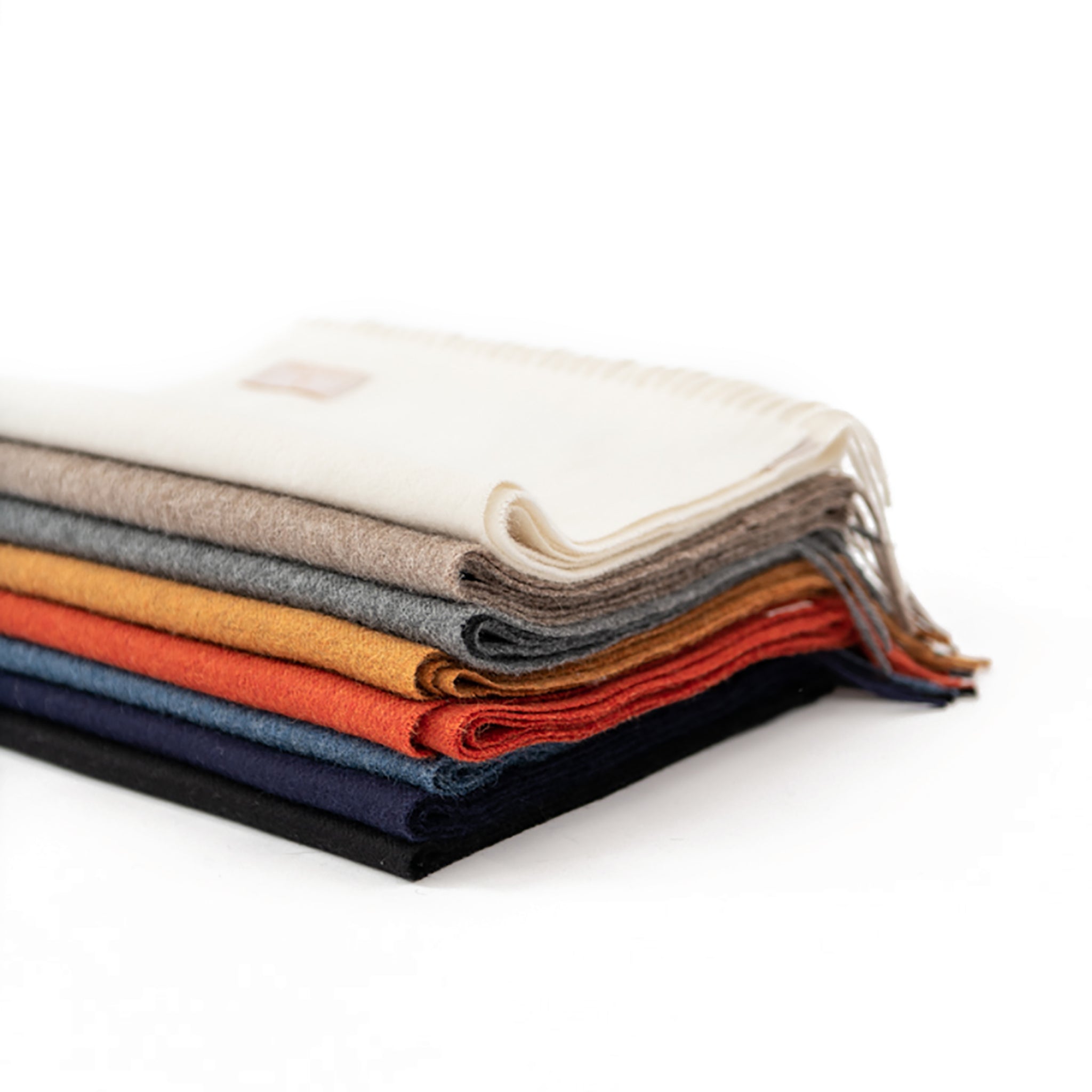 stick-and-ball-alpaca-scarves-in-white-taupe-grey-mustard-yellow-coral-denim-blue-black