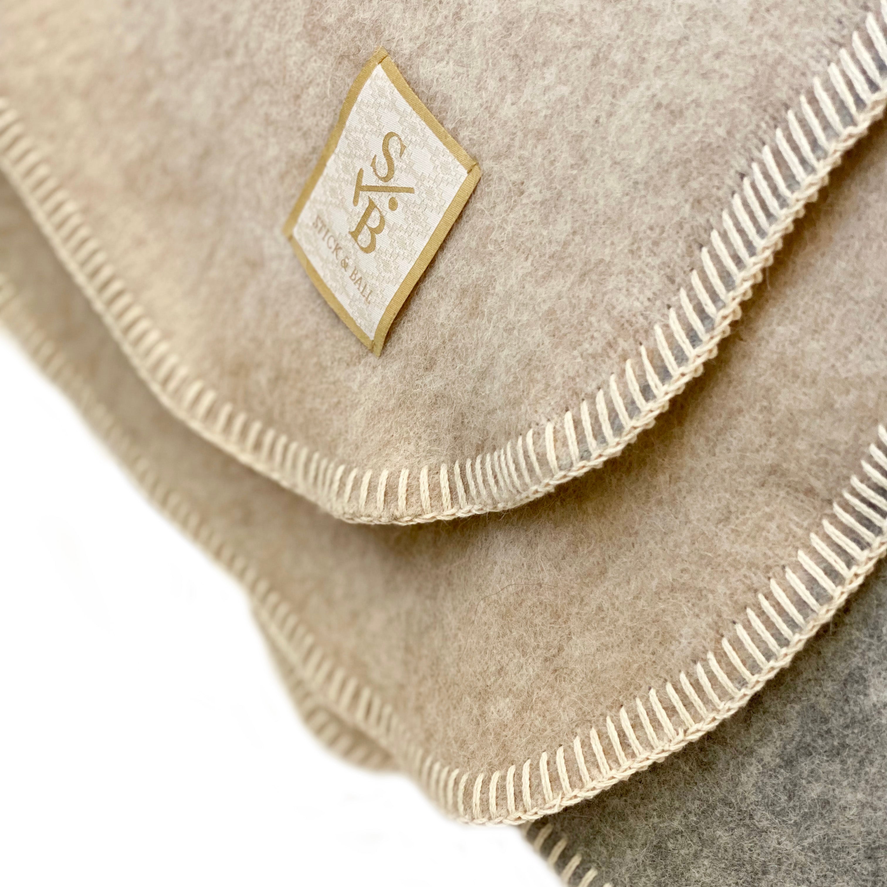 stick-and-ball-home-decor-double-faced-alpaca-throw-with-whipstich-taupe-and-light-grey-stitching-detail