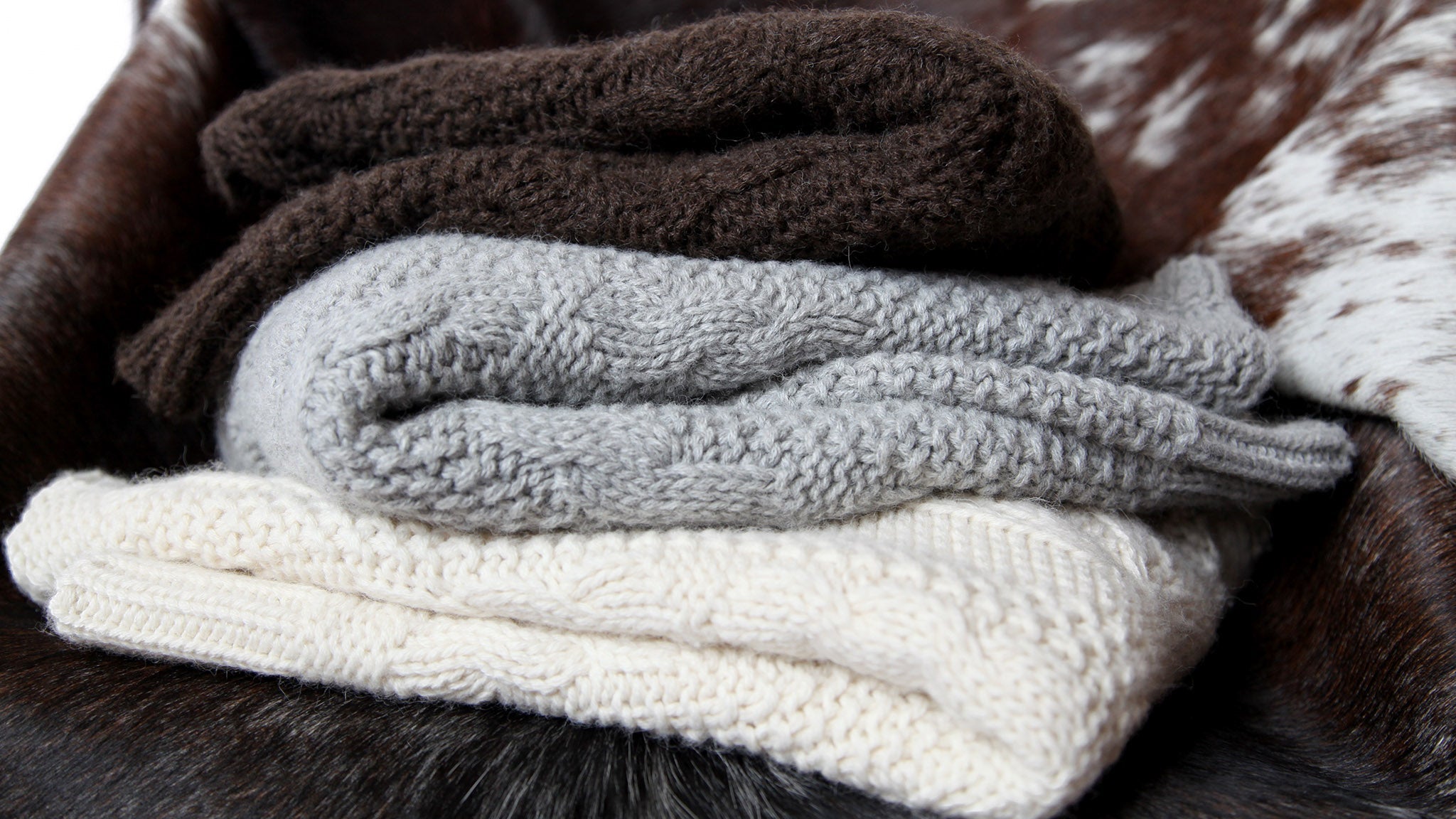 Woman wearing Handwoven Alpaca Fringe Ruana Wrap in Winter White - Stick & Ball