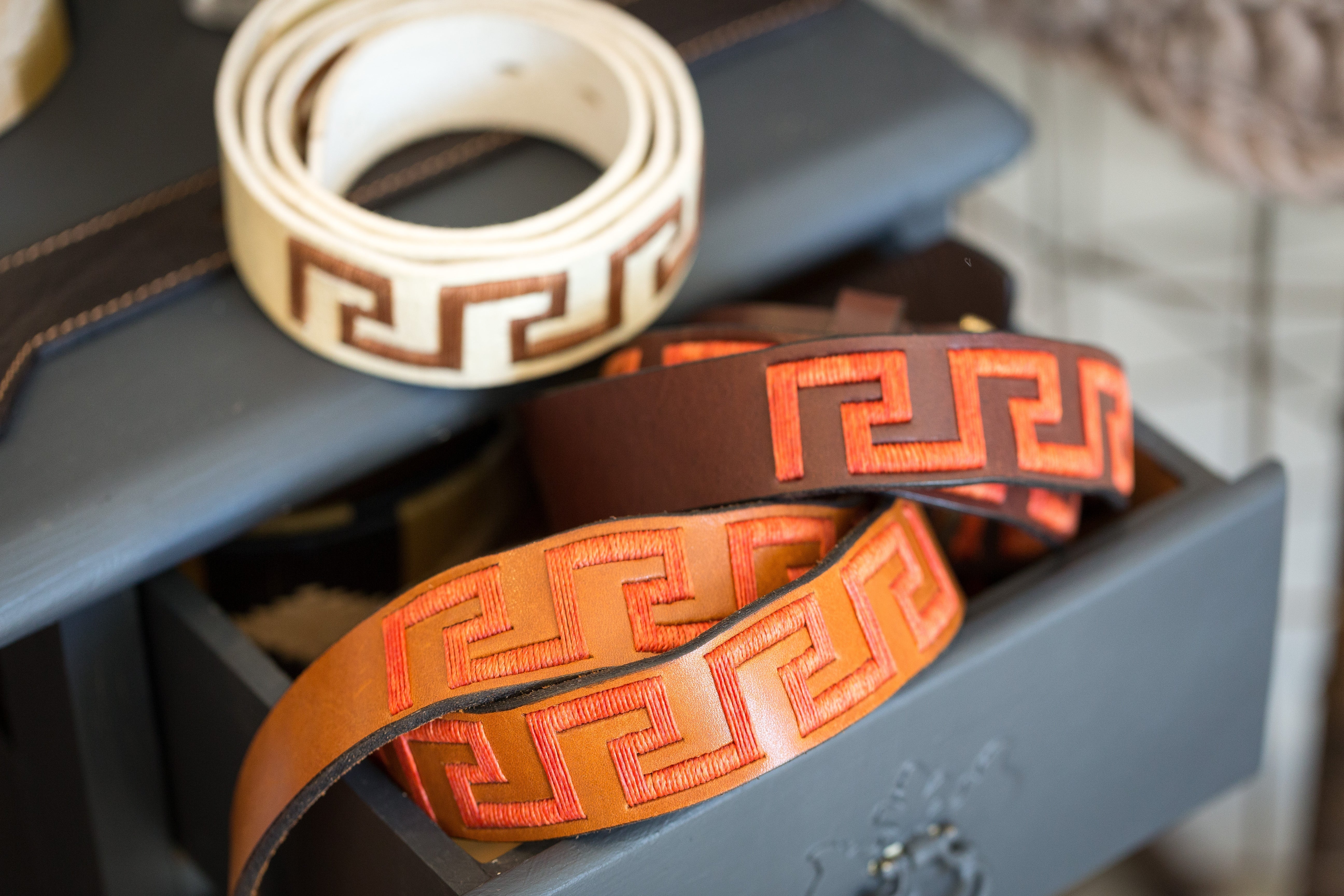 Collection image for Men's Belts & Buckles - Luxury Leather Belts coiled and spilling out of drawer