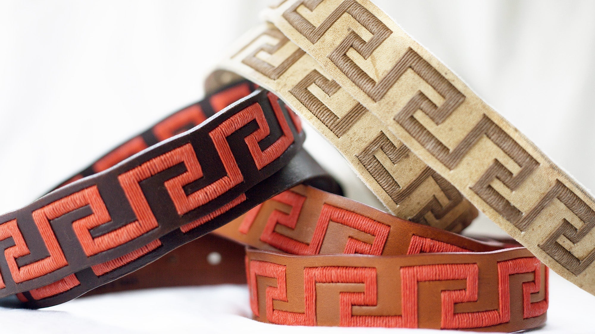 Collection image for Belts & Buckles - Luxury Leather Belts coiled and stacked