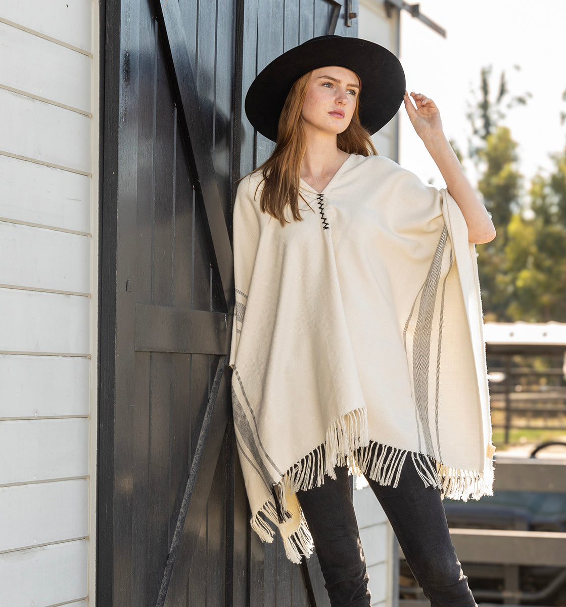 woman-wearing-a-stick-and-ball-lightweight-alpaca-poncho