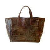 Stick & Ball The Faux Coco Italian Leather Weekender Bag in espresso brown, debossed with a Nile Croc pattern by hand